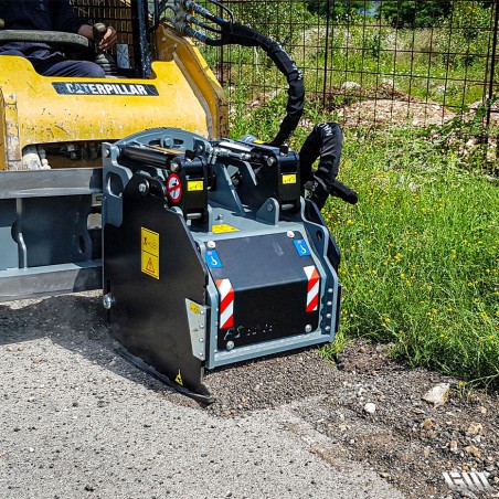 raboteuse de voirie sur chargeuse CAT