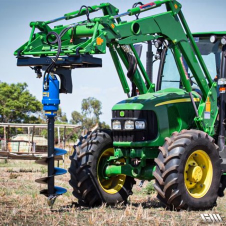 Chargeur de tracteur avec tarière