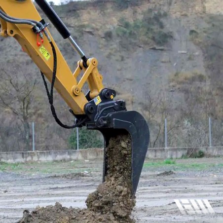 Godet renforcé pour manutention de matériaux rocheux