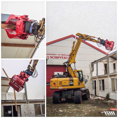 Déconstruction d'une maison avec pelle hydraulique